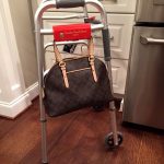 Slip Clip Holding Purse on Walker