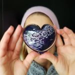 Parisian Night Glass Heart Paperweight In Hand