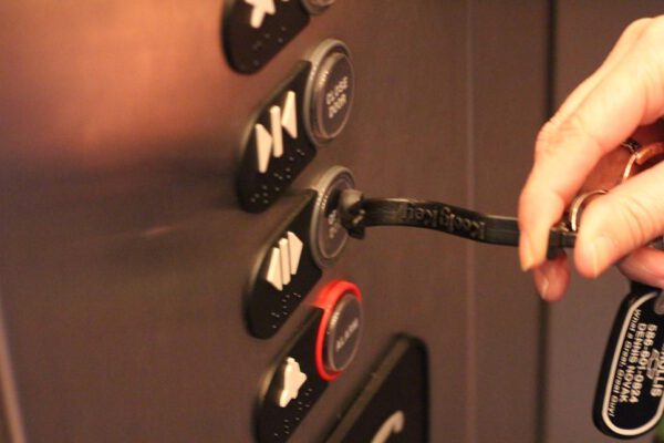 Use the Kooty Key in the Elevator