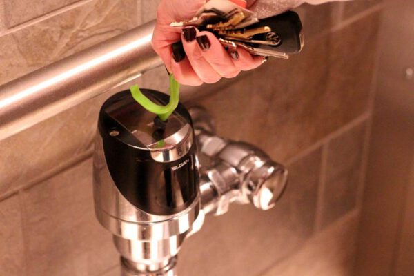 Use the Kooty Key to Flush Toilets