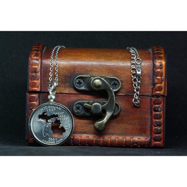 Michigan Silhouette Quarter Necklace on treasure chest
