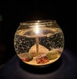 Lit Smokeless Gel Wax Rock Glass Candle by Rock Bottom Candle Co