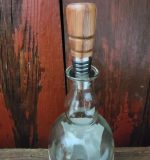 Bourbon Bottle Stopper Canary Wood in bottle