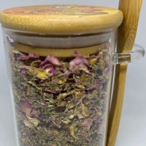Organic Love Tea in jar with wooden spoon