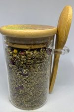 Organic Peace Tea in Jar with Wooden Spoon