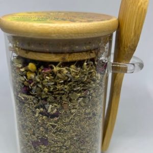 Organic Peace Tea in Jar with Wooden Spoon