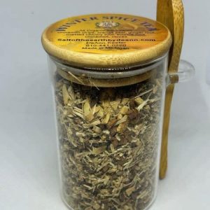 Organic Winter Spice Tea in Jar with Wooden Spoon