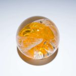 Orange Circle of Life Paperweight