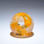 Orange Circle of Life Paperweight_sideview