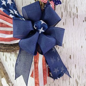 Stars and Stripes Wreath with patriotic whirligigs